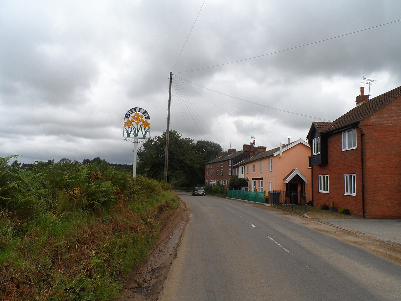 Butley, houses and village sign
