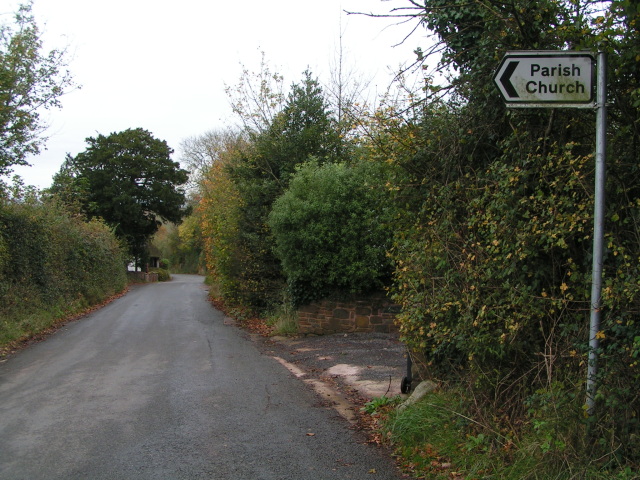 Road into Dunchideock and the sign to the Parish Church