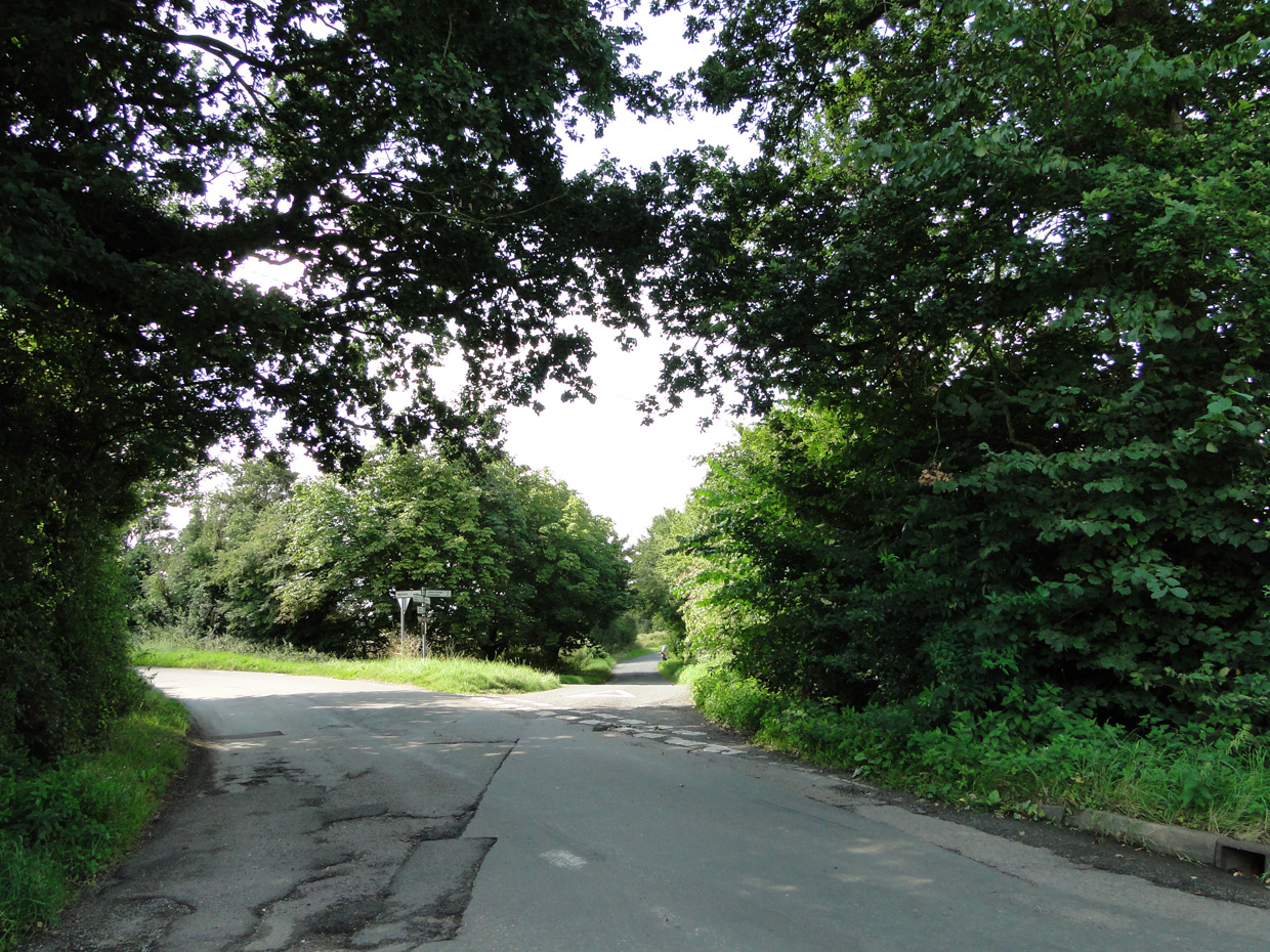 Badly patched-up road at Broad Street, Groton