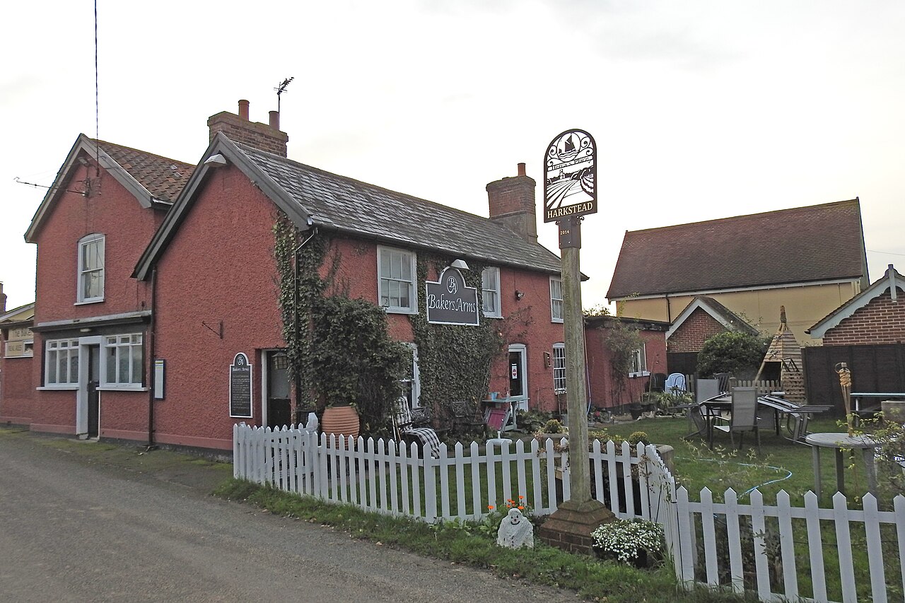 Harkstead village sign outside the Baker's Arms