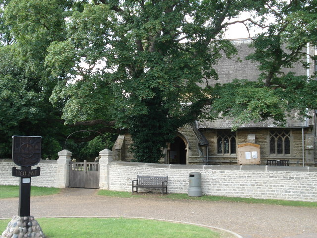 Village sign and church, Holme