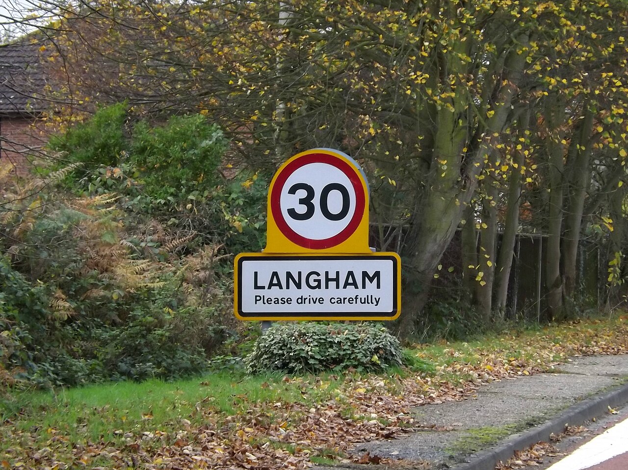 Langham Village Name sign on Birchwood Road