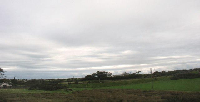 Cottages north-west of the village of Llanfaelog