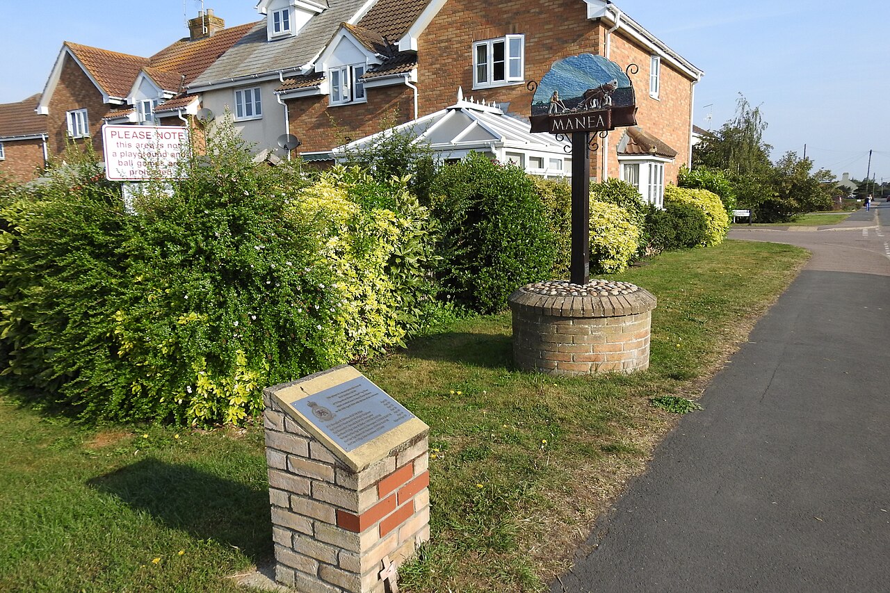 Manea village sign and memorial