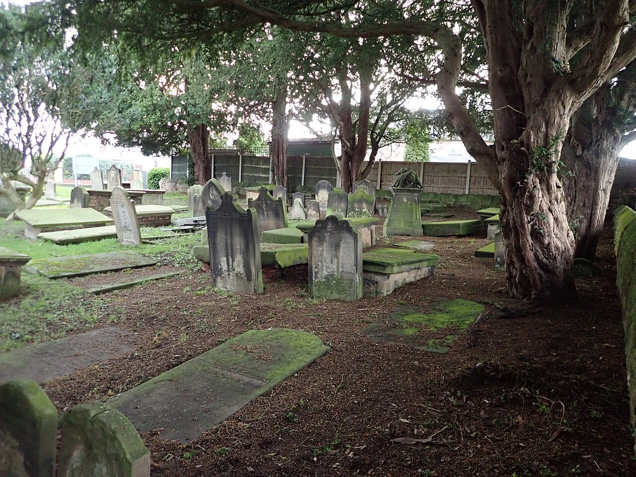 Old gravestones at the Parish Church of Saint Deiniol and Saint Marcella, Marchwiel