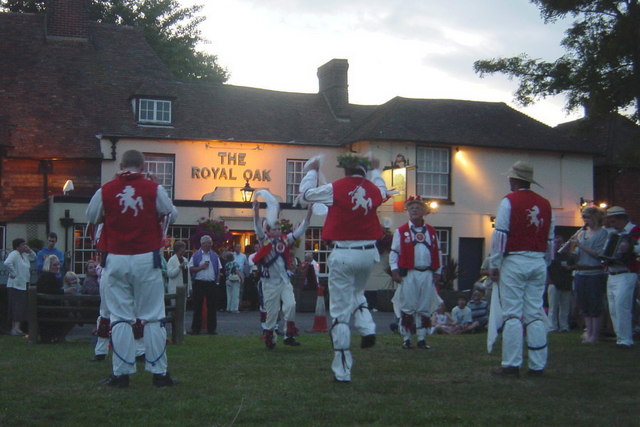 Morris Men on Green in front of Pub