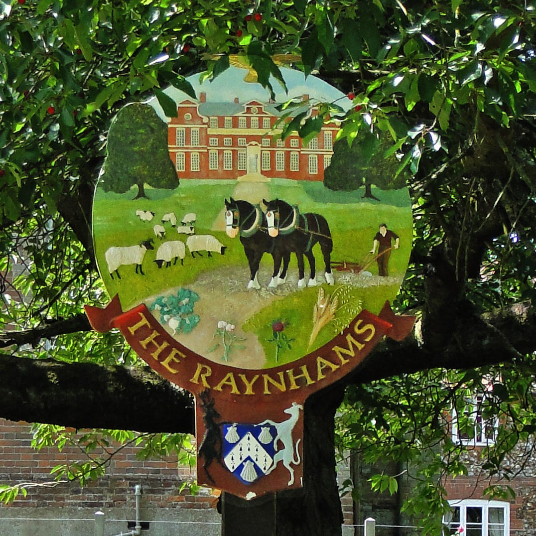 The Raynhams village sign